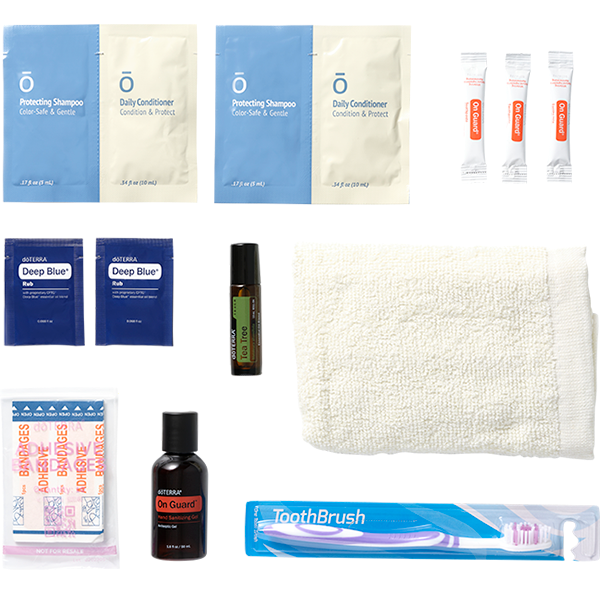 Collection of personal care items including shampoo, conditioner, towel, and toothbrush on a white background.