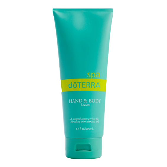 A tube of dôTERRA Spa Hand & Body Lotion with a green label and blue cap.
