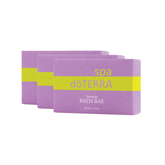 Three bars of dØTERRA Serenity Spa Bath Bar packaged in purple and yellow wrapping.